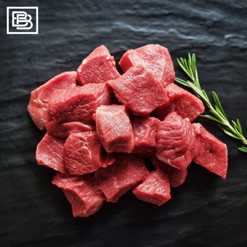 Grass Fed Diced Beef Cubes With Sprig of Rosemary